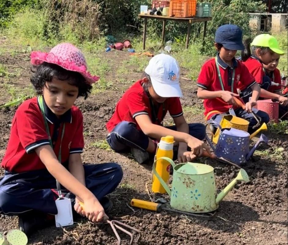 Children gardening outdoors
