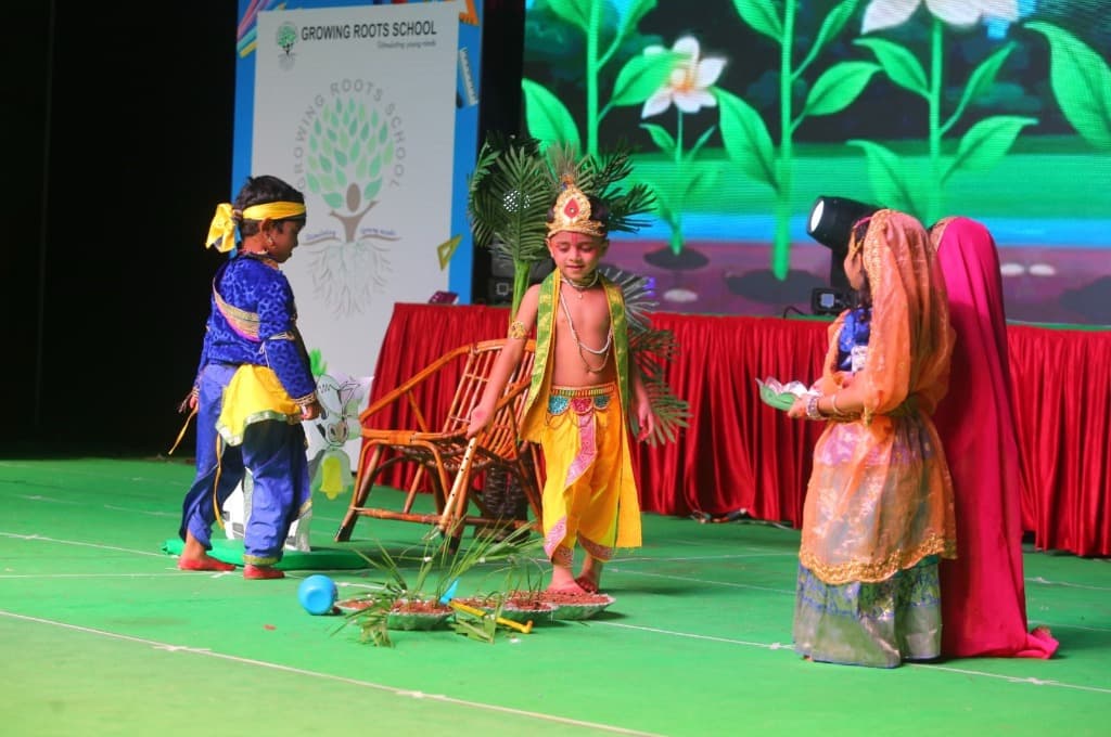 Students performing on stage for Annual Day 2025
