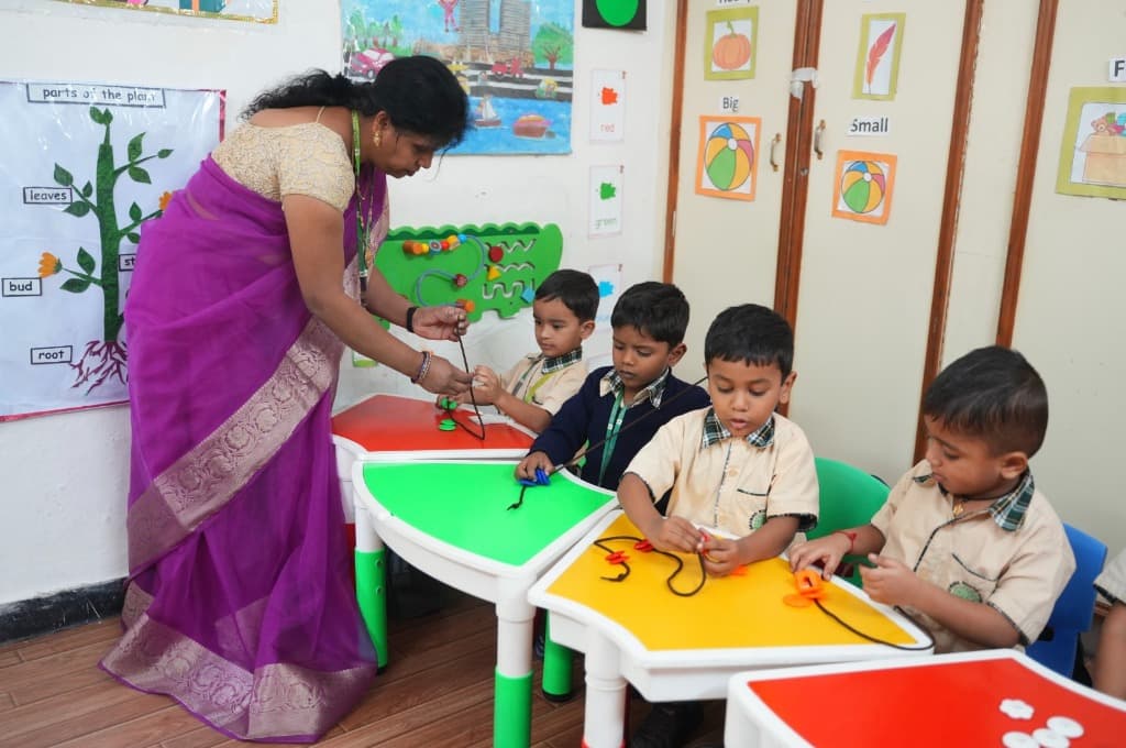 Children performing motor skills activities inside the classroom